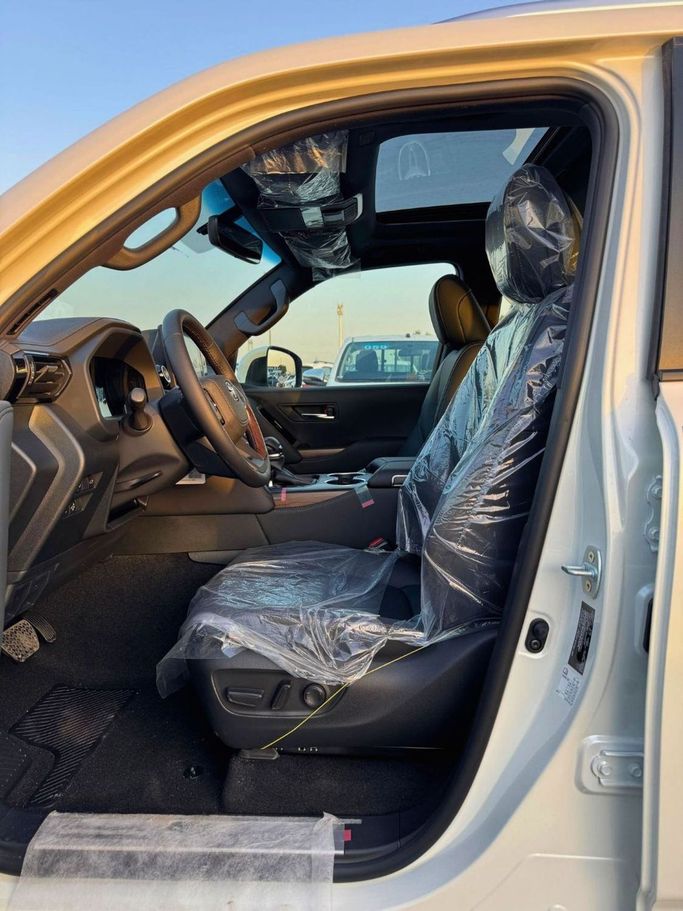 New Toyota Land Cruiser 300 Series, 4.0 l, 2025 in Dubai by SK Motors, White color. GCC Specs | AUTO.AE