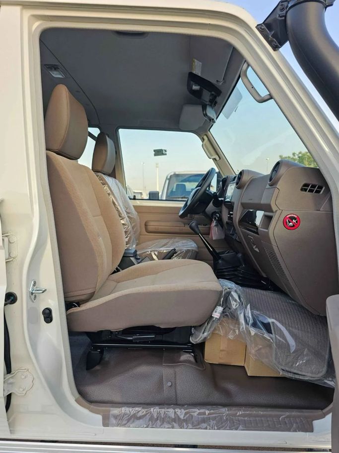 New Toyota Land Cruiser 70 Series Facelift 2, 4.5 l, 2025 in Dubai by SK Motors, White color. GCC Specs | AUTO.AE
