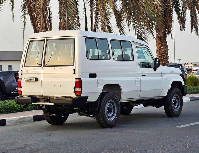 New Toyota Land Cruiser 70 Series Facelift 2, 4.5 l, 2024 in Dubai by SK Motors, White color. GCC Specs | AUTO.AE