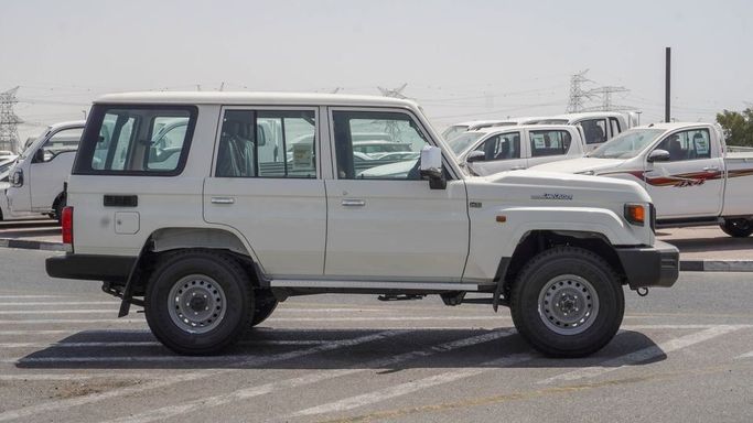 New Toyota Land Cruiser 70 Series Facelift 2, 4.0 l, 2025 in Dubai by Najem Motors, White color. GCC Specs | AUTO.AE