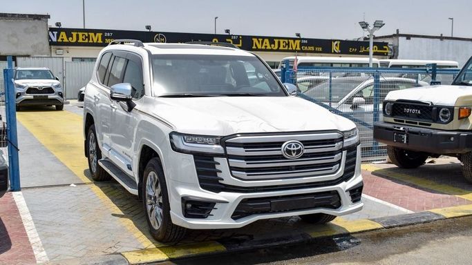 New Toyota Land Cruiser 300 Series, 3.4 l, 2024 in Dubai by Najem Motors, White color. GCC Specs | AUTO.AE