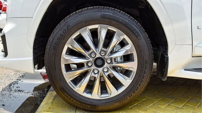 New Toyota Land Cruiser 300 Series, 3.4 l, 2024 in Dubai by Najem Motors, White color. GCC Specs | AUTO.AE