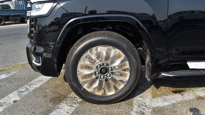 New Toyota Land Cruiser 300 Series, 4.0 l, 2024 in Dubai by Najem Motors, Black color. GCC Specs | AUTO.AE