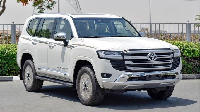 New Toyota Land Cruiser 300 Series, 3.4 l, 2024 in Dubai by Najem Motors, White color. GCC Specs | AUTO.AE