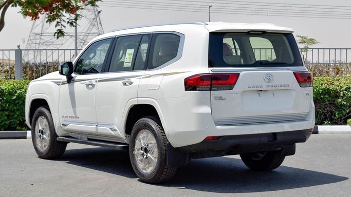 New Toyota Land Cruiser 300 Series, 3.4 l, 2024 in Dubai by Najem Motors, White color. GCC Specs | AUTO.AE