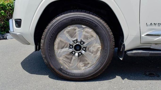 New Toyota Land Cruiser 300 Series, 3.4 l, 2024 in Dubai by Najem Motors, White color. GCC Specs | AUTO.AE