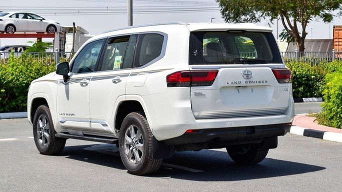 New Toyota Land Cruiser 300 Series, 3.4 l, 2024 in Dubai by Najem Motors, White color. GCC Specs | AUTO.AE