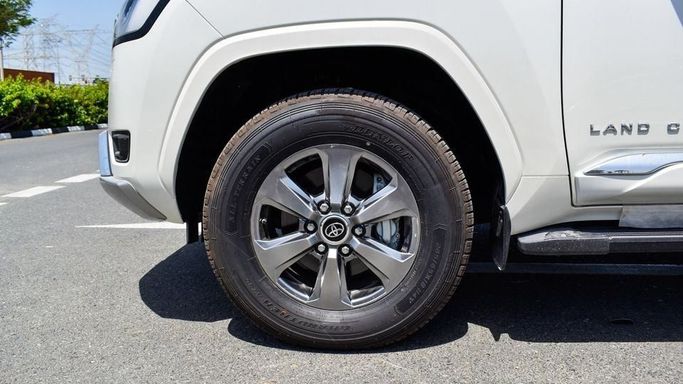 New Toyota Land Cruiser 300 Series, 3.4 l, 2024 in Dubai by Najem Motors, White color. GCC Specs | AUTO.AE