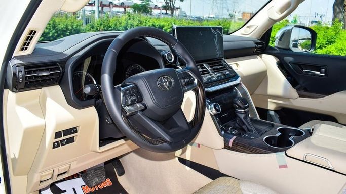New Toyota Land Cruiser 300 Series, 3.4 l, 2024 in Dubai by Najem Motors, White color. GCC Specs | AUTO.AE