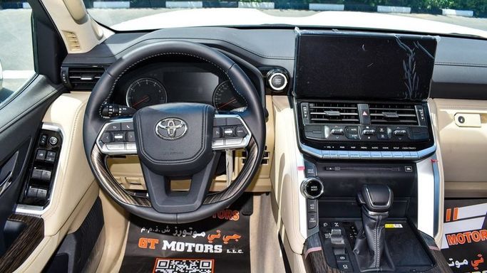 New Toyota Land Cruiser 300 Series, 3.4 l, 2024 in Dubai by Najem Motors, White color. GCC Specs | AUTO.AE