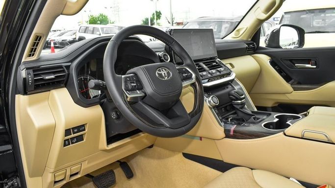 New Toyota Land Cruiser 300 Series, 3.4 l, 2023 in Dubai by Najem Motors, Black color. GCC Specs | AUTO.AE