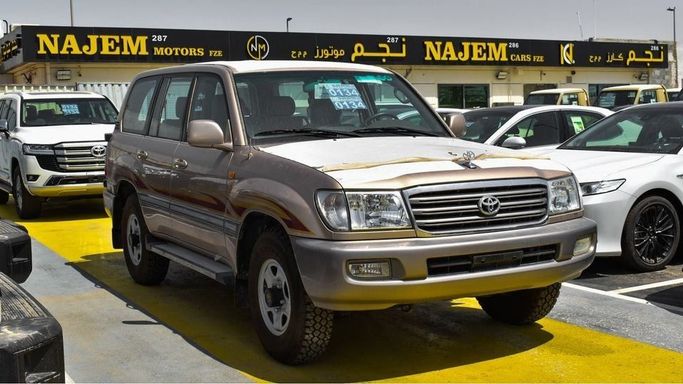Used Toyota Land Cruiser 100 Series Facelift 1, 4.5 l, 2005 in Dubai by Najem Motors, Golden color. GCC Specs | AUTO.AE