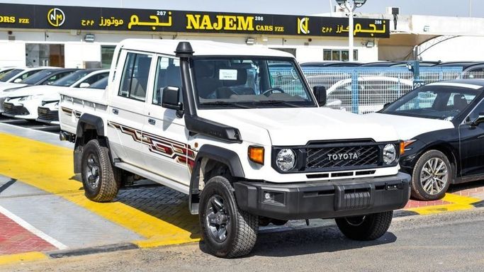 New Toyota Land Cruiser 70 Series Facelift 2, 4.0 l, 2024 in Dubai by Najem Motors, White color. GCC Specs | AUTO.AE