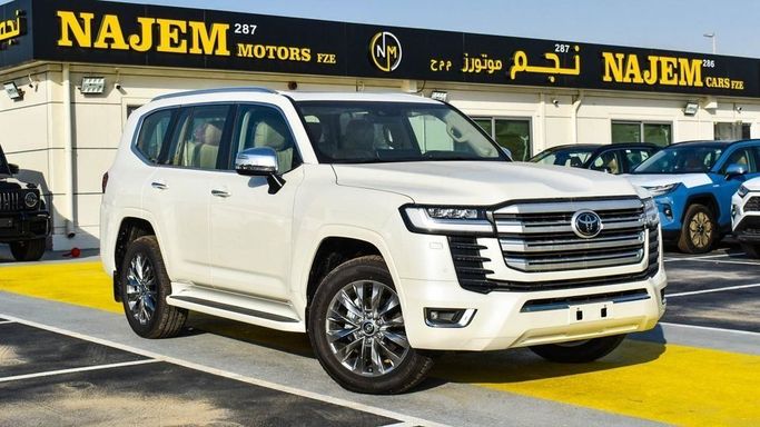 New Toyota Land Cruiser 300 Series, 4.0 l, 2023 in Dubai by Najem Motors, White color. GCC Specs | AUTO.AE