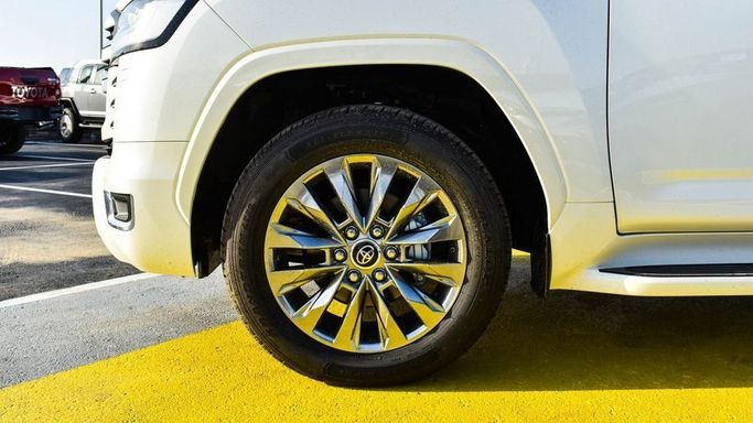 New Toyota Land Cruiser 300 Series, 4.0 l, 2023 in Dubai by Najem Motors, White color. GCC Specs | AUTO.AE