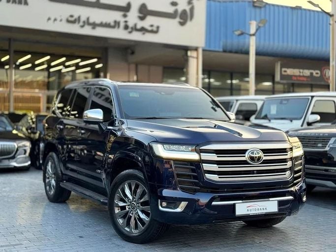 Used Toyota Land Cruiser 300 Series, 4.0 l, 2023 in Dubai by Auto Bank Motors, Navy Blue color. GCC Specs | AUTO.AE