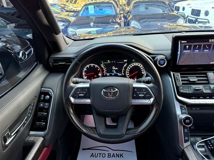 Used Toyota Land Cruiser 300 Series, 4.0 l, 2023 in Dubai by Auto Bank Motors, Navy Blue color. GCC Specs | AUTO.AE