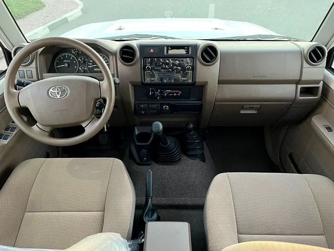 New Toyota Land Cruiser 70 Series Facelift 1, 4.5 l, 2023 in Dubai by We Can Motors, White color. GCC Specs | AUTO.AE