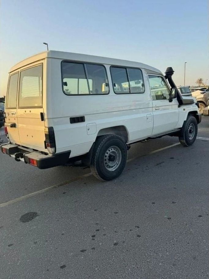 New Toyota Land Cruiser 70 Series Facelift 2, 2.8 l, 2025 in Dubai by Al Rawnaq Motors , White color. GCC Specs | AUTO.AE