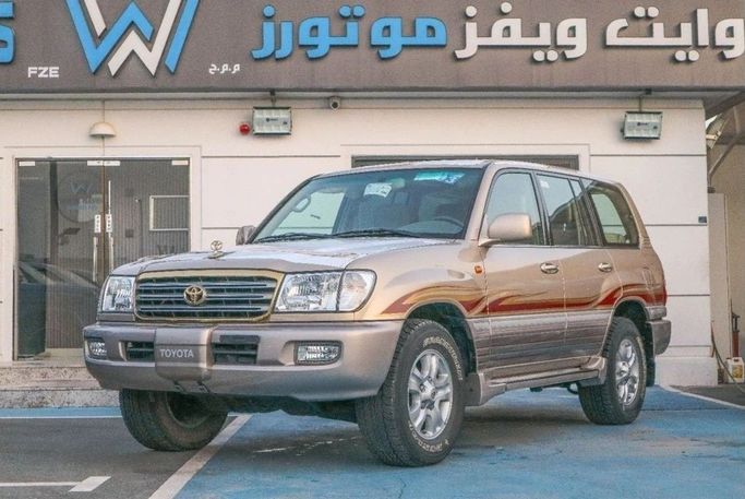 Подержанный Toyota Land Cruiser 100 Series Рестайлинг 2, 4.5 л, 2005 в Дубае от White Waves Motors Fze Золотистый цвет. GCC | AUTO.AE