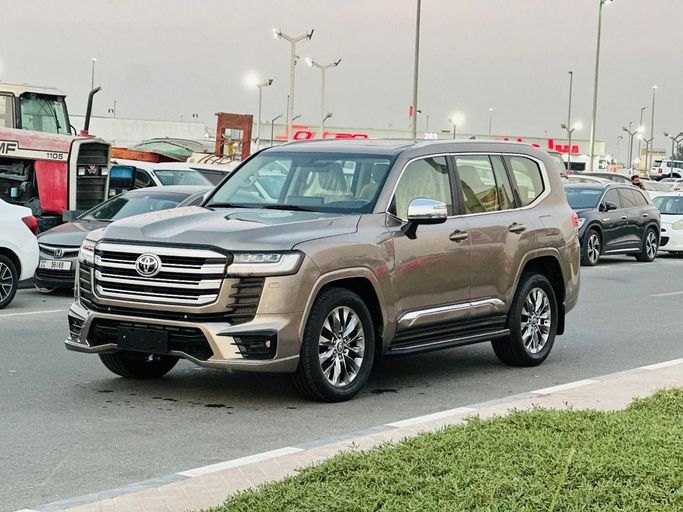 Used Toyota Land Cruiser 300 Series, 4.0 l, 2022 in Dubai by Global Motors, Brown color. GCC Specs | AUTO.AE