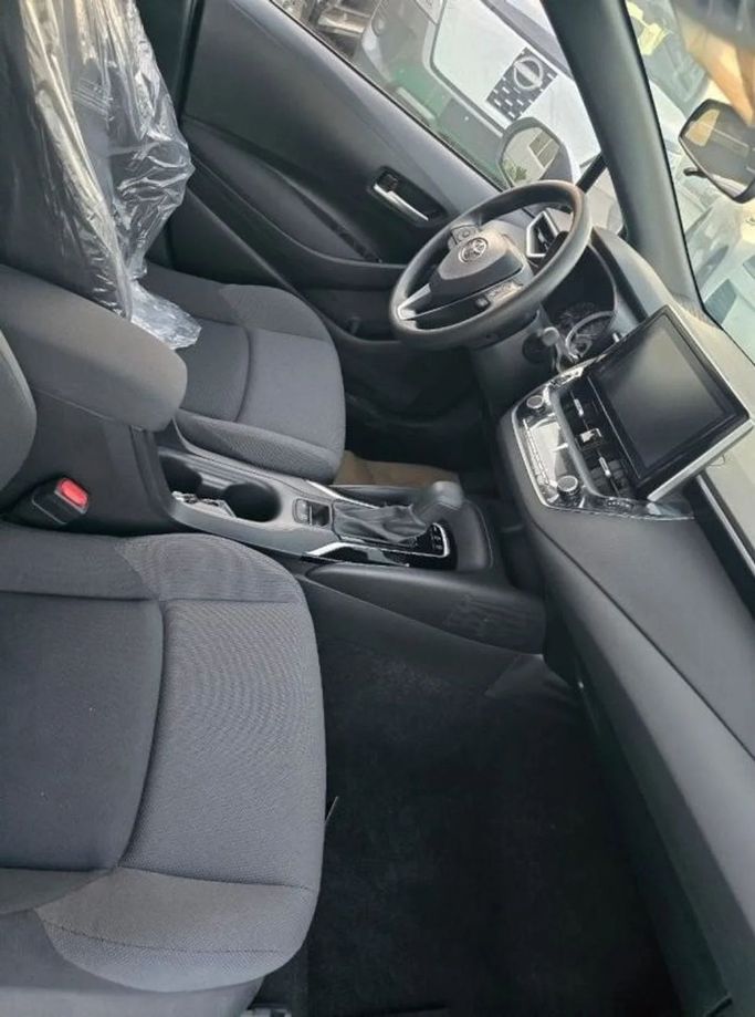 New Toyota Levin XII (E210) Facelift, 1.2 l, 2025 in Dubai by Mohamed Hakim Motors, White color. Chinese Specs | AUTO.AE