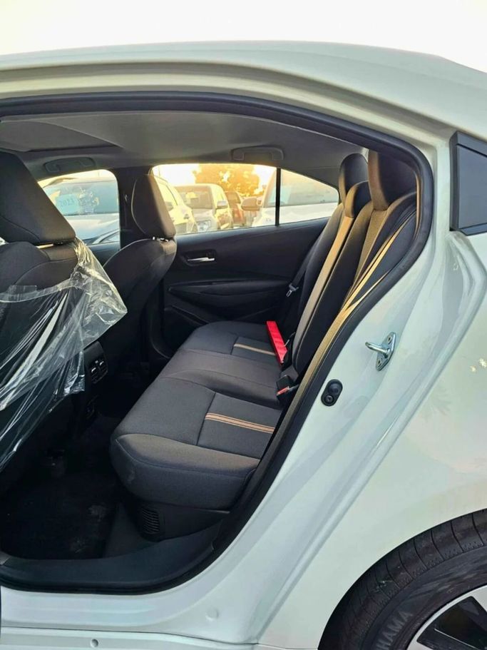 New Toyota Levin XII (E210) Facelift, 1.8 l, 2025 in Dubai by SK Motors, White color. Chinese Specs | AUTO.AE