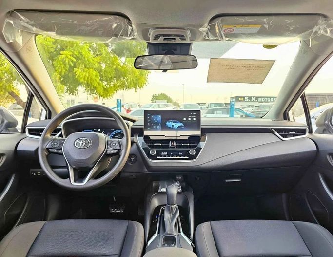 New Toyota Levin XII (E210) Facelift, 1.8 l, 2025 in Dubai by SK Motors, White color. Chinese Specs | AUTO.AE