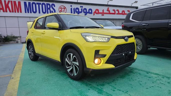 New Toyota Raize I, 1.0 l, 2023 in Dubai by Mohamed Hakim Motors, Yellow color. GCC Specs | AUTO.AE