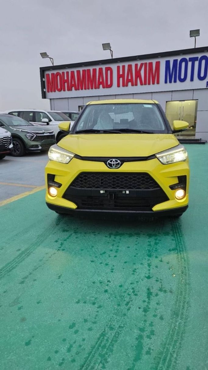 New Toyota Raize I, 1.0 l, 2023 in Dubai by Mohamed Hakim Motors, Yellow color. GCC Specs | AUTO.AE