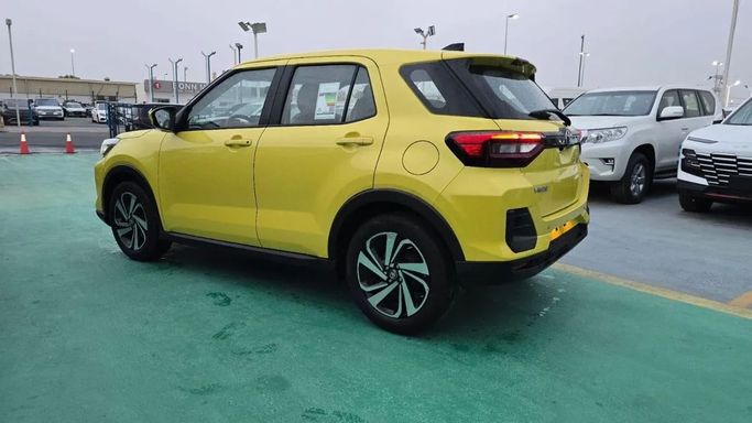 New Toyota Raize I, 1.0 l, 2023 in Dubai by Mohamed Hakim Motors, Yellow color. GCC Specs | AUTO.AE