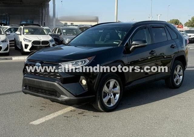 Used Toyota RAV4 V (XA50), 2.5 l, 2021 in Dubai by Alhamd Motors, Black color. American Specs | AUTO.AE
