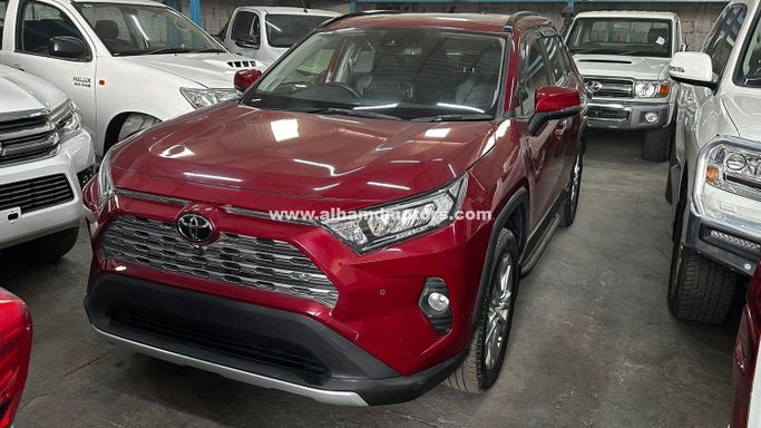 Used Toyota RAV4 V (XA50), 2.5 l, 2021 in Dubai by Alhamd Motors, Red color. Other | AUTO.AE