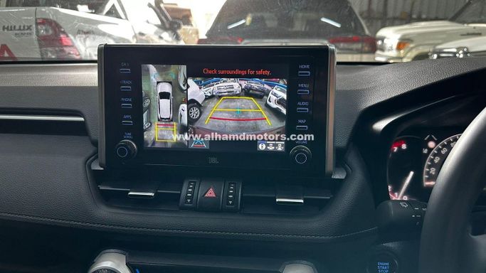 Used Toyota RAV4 V (XA50), 2.5 l, 2021 in Dubai by Alhamd Motors, Red color. Other | AUTO.AE