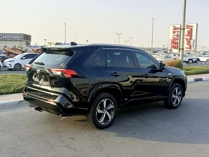 Подержанный Toyota RAV4 V (XA50), 2.5 л, 2023 в Дубае от Lucky Star Motors Черный цвет. Американская | AUTO.AE