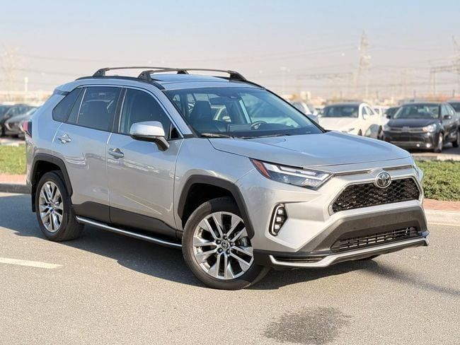 Used Toyota RAV4 V (XA50), 2.5 l, 2022 in Dubai by GHAZNI MOTORS, Silver color. American Specs | AUTO.AE | Listing #259124