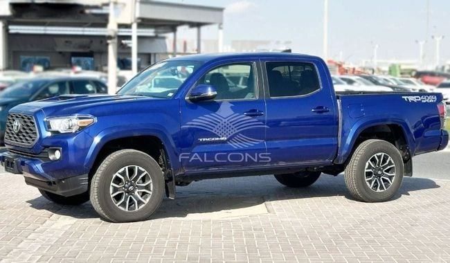 New Toyota Tacoma III, 3.5 l, 2022 in Dubai by Falcons GT Motors FZCO, Blue color. Canadian Specs | AUTO.AE