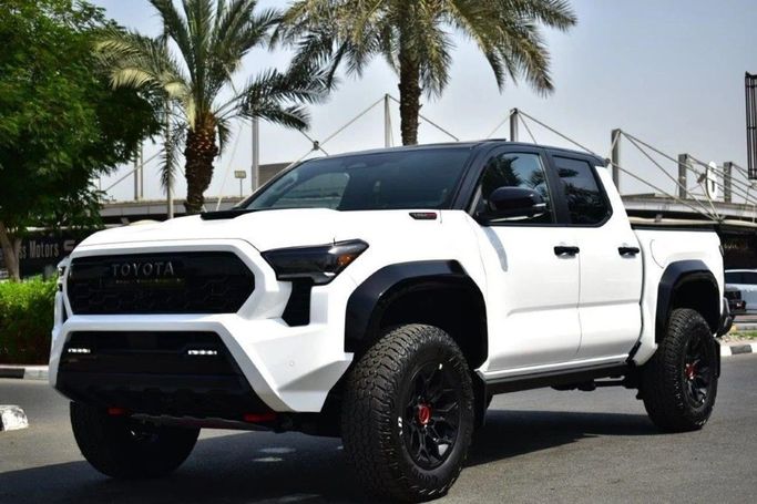 New Toyota Tacoma IV, 2.4 l, 2025 in Dubai by World Center Motors FZE, White color. Canadian Specs | AUTO.AE