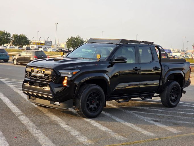 مستعملة Toyota Tacoma رابعاً, 2.4 l, 2024 في في دبي من Aryana Motors Fzco، اللون أسود. المواصفات الأمريكية | AUTO.AE