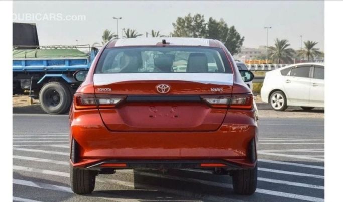 New Toyota Yaris IV, 1.5 l, 2025 in Dubai by Mohamed Hakim Motors, Orange color. GCC Specs | AUTO.AE
