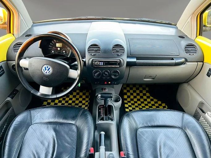 Подержанный Volkswagen Beetle I (A4), 2.0 л, 2001 в Дубае от Mirza Automobile FZE Желтый цвет. Японская | AUTO.AE