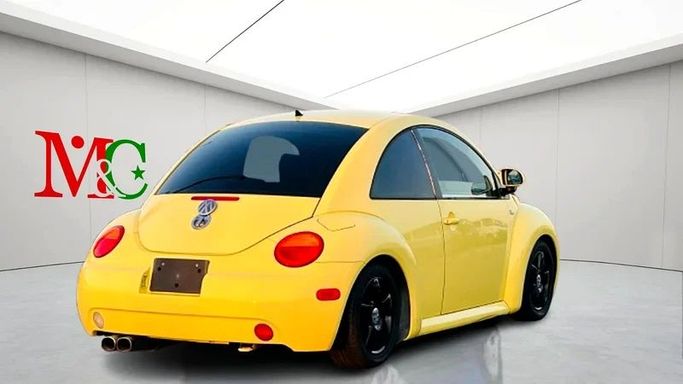 Подержанный Volkswagen Beetle I (A4), 2.0 л, 2001 в Дубае от Mirza Automobile FZE Желтый цвет. Японская | AUTO.AE