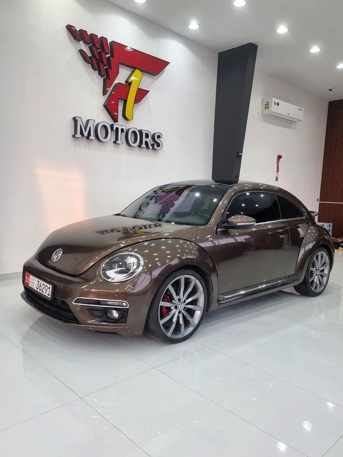 Used Volkswagen Beetle II (A5), 2.0 l, 2016 in Dubai by F1 Motors, Brown color. GCC Specs | AUTO.AE