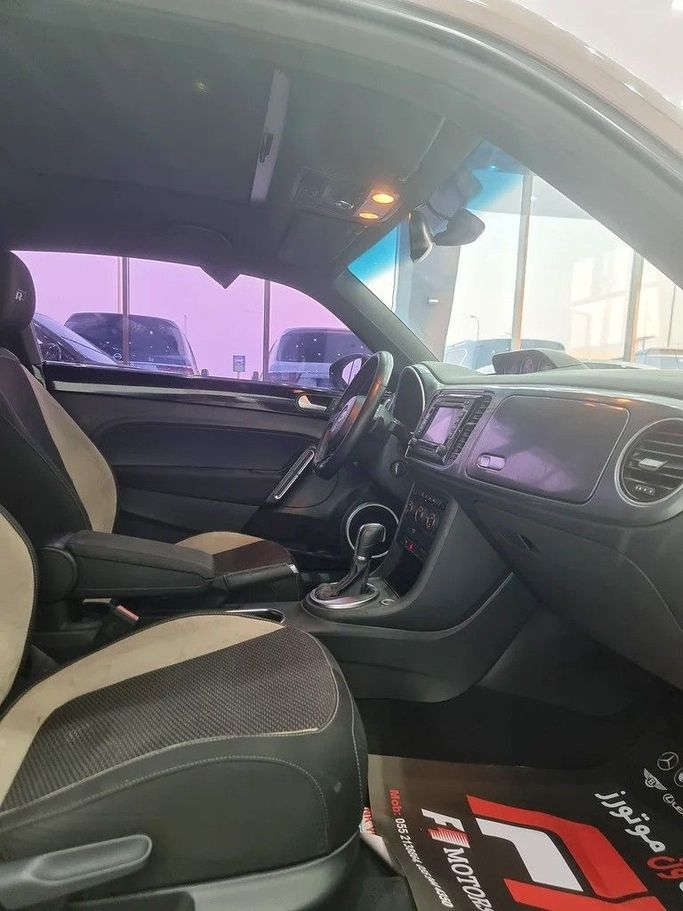 Used Volkswagen Beetle II (A5), 2.0 l, 2016 in Dubai by F1 Motors, Brown color. GCC Specs | AUTO.AE