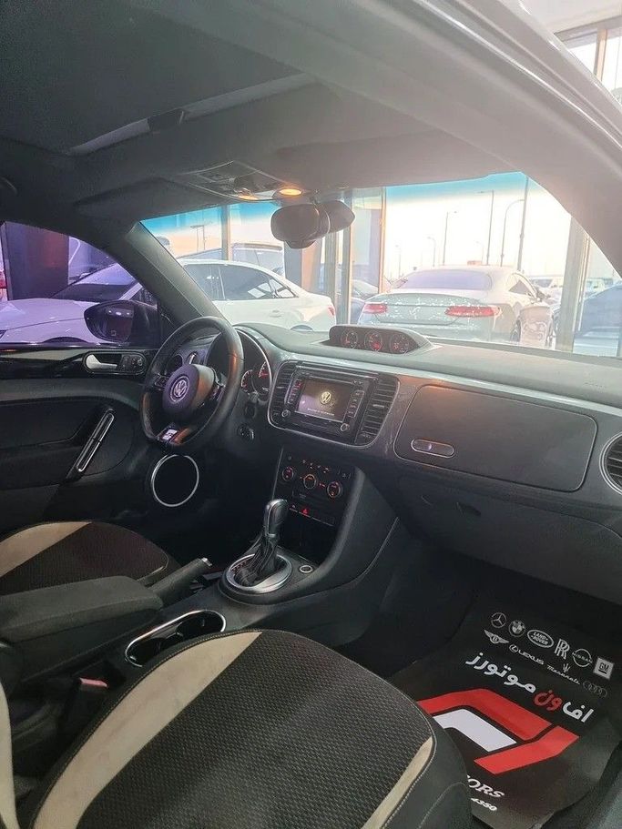 Used Volkswagen Beetle II (A5), 2.0 l, 2016 in Dubai by F1 Motors, Brown color. GCC Specs | AUTO.AE