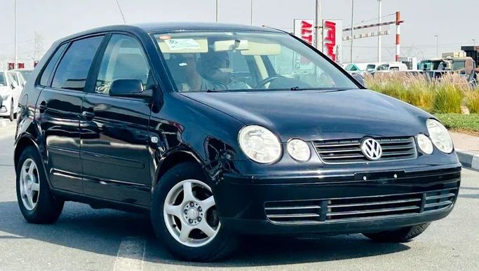 Подержанный Volkswagen Polo IV, 1.4 л, 2005 в Дубае от Mirza Automobile FZE Черный цвет. Японская | AUTO.AE