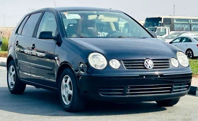 Подержанный Volkswagen Polo IV, 1.4 л, 2005 в Дубае от Mirza Automobile FZE Черный цвет. Японская | AUTO.AE