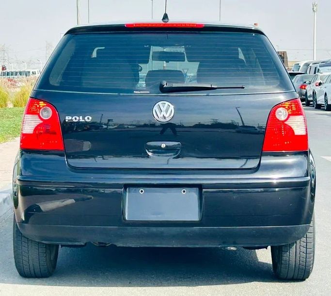 Подержанный Volkswagen Polo IV, 1.4 л, 2005 в Дубае от Mirza Automobile FZE Черный цвет. Японская | AUTO.AE