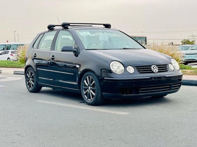 Used Volkswagen Polo IV, 1.4 l, 2004 in Dubai by Al Abbas Motors, Black color. Japanese Specs | AUTO.AE