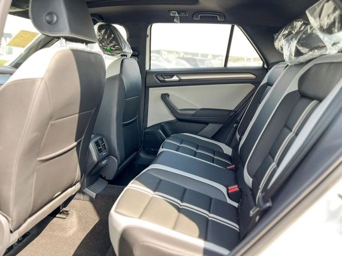 Новый Volkswagen T-Roc I Рестайлинг, 1.5 л, 2025 в Дубае от Al Rawnaq Motors  Белый цвет. Китайская | AUTO.AE